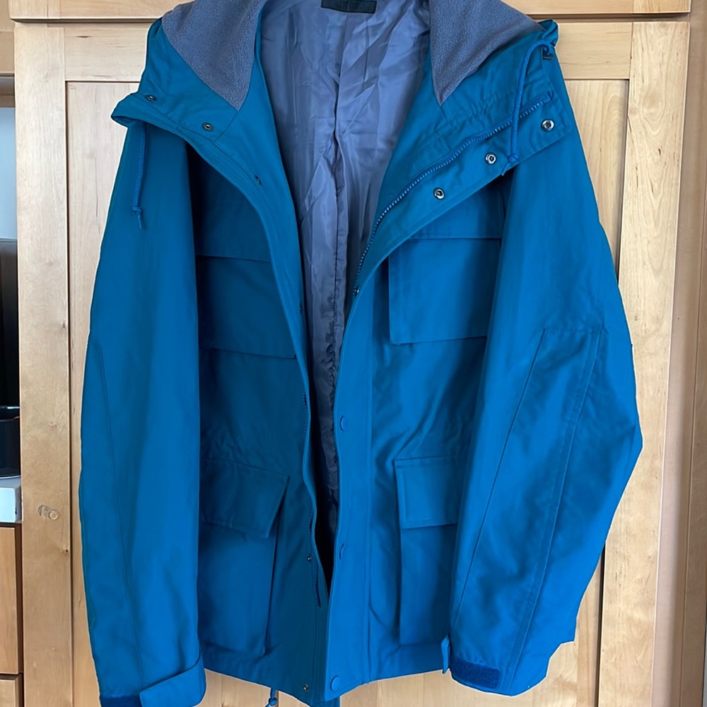 Uniqlo Jacket w hood. Color is teal
